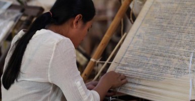 Woman making fabric in Cambodia