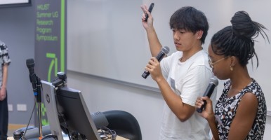 Global Interns at KHUST present their research at a symposium.