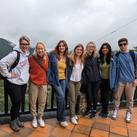 Senior lecturer Julie Ficarra and students in Ecuador for a spring break program.